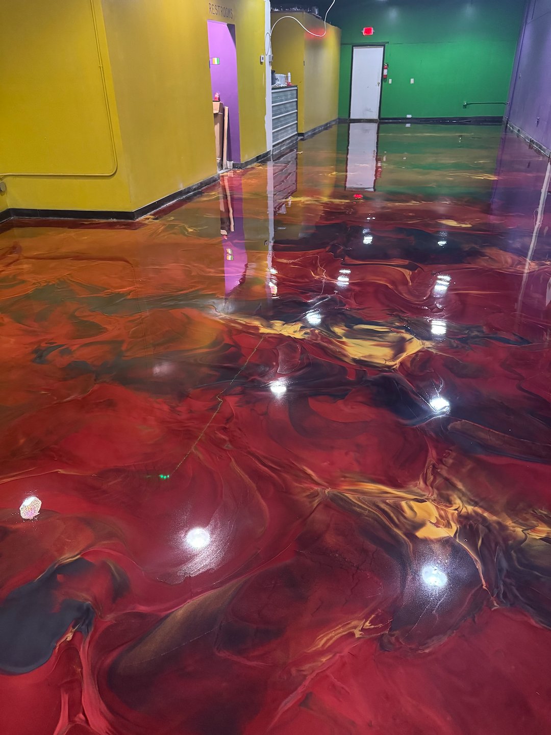 Amazing commercial metallic epoxy flooring project completed in downtown, Montgomery, Al