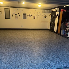 Wonderful-white-and-black-epoxy-flake-installation-done-in-Deer-Creek-subdivision-of-Montgomery-AL 1