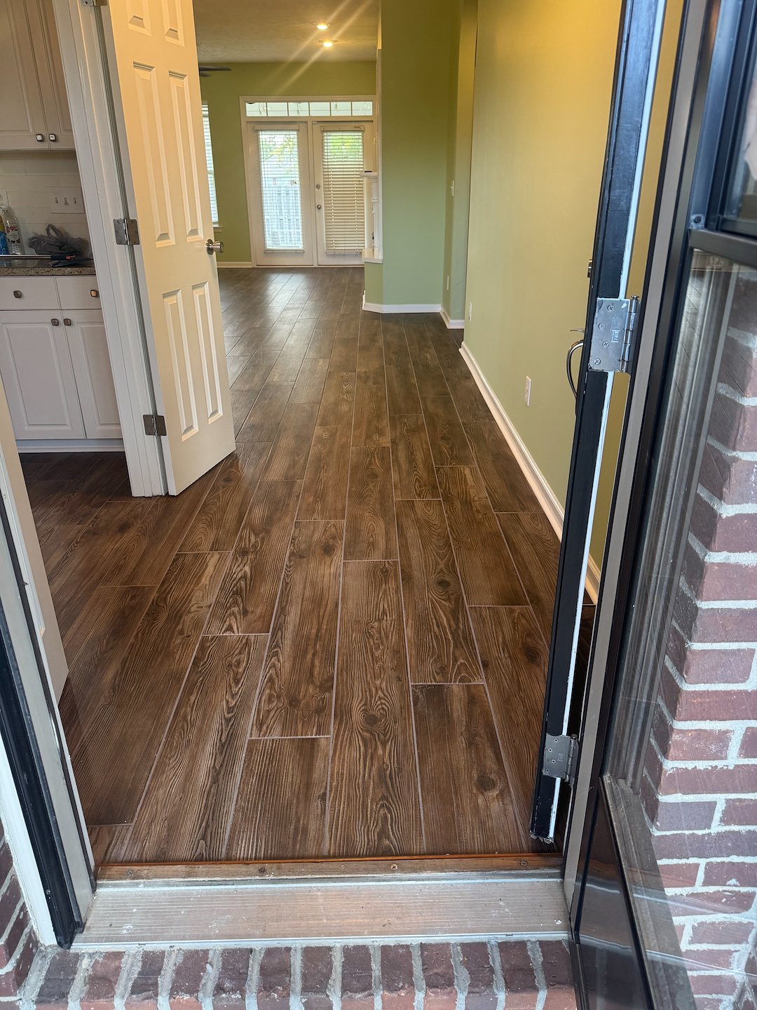 Wood look floor tile installation done in a spectacular fashion 